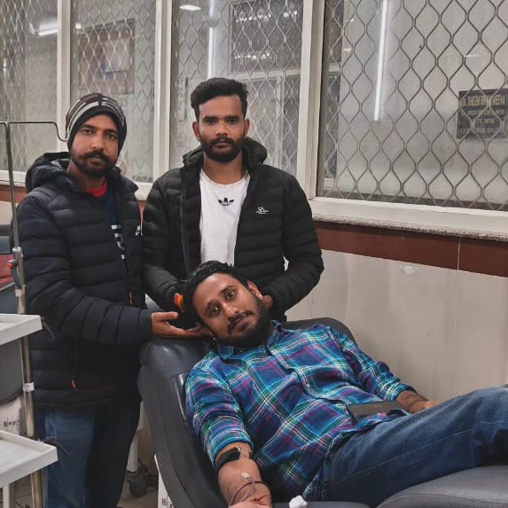 Friends supporting a blood donor